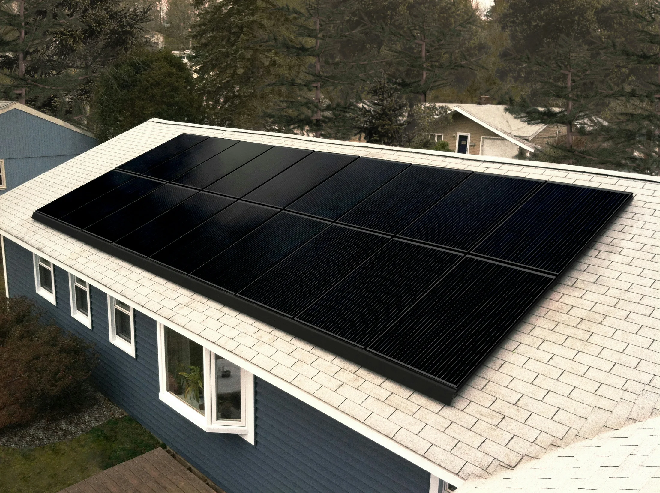 Black photovoltaic modules installed in a clean roof array