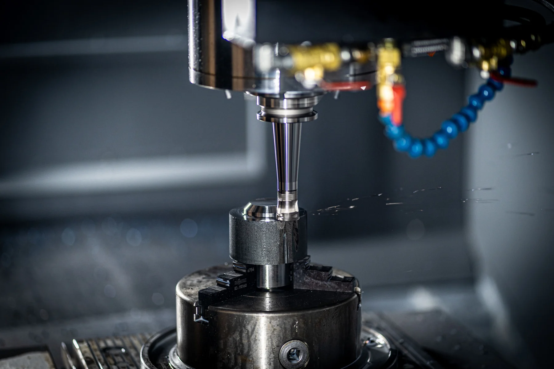 Precision machining of a metal component, illustrating custom manufacturing